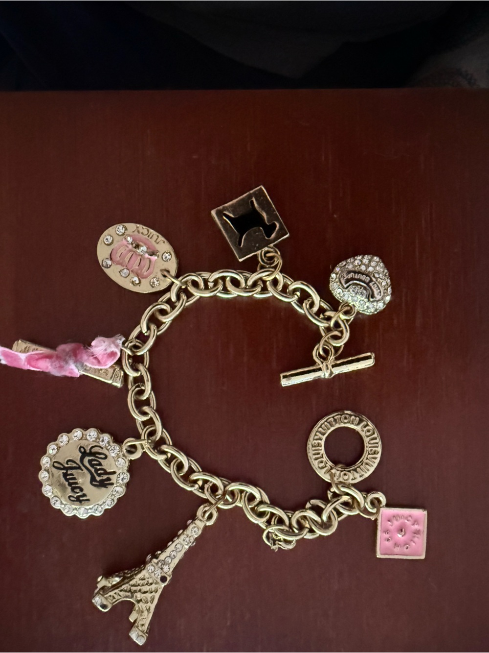 Gold-Tone Pink Charm Bracelet